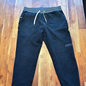 Vuori Black Drawstring Joggers with Subtle Stripe Detail